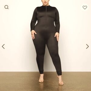 Skims Gunmetal front zip onesie